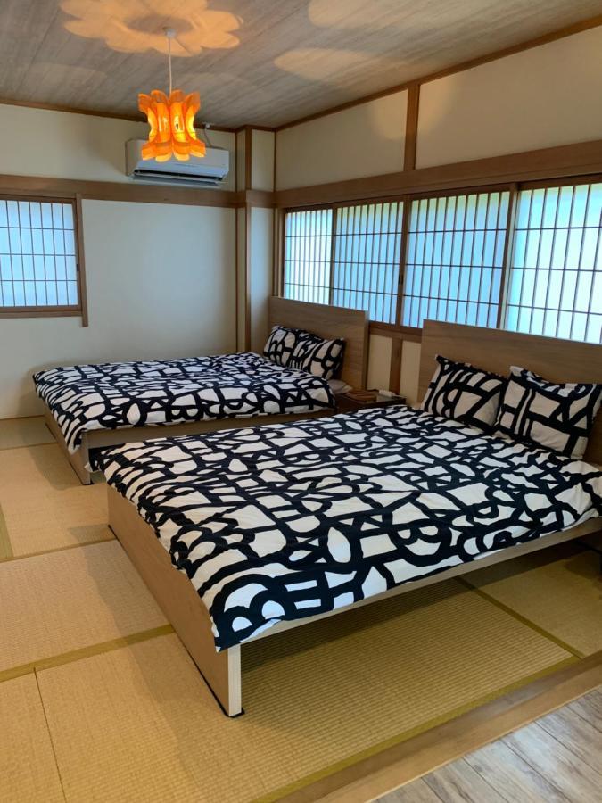 Guest House Apple Ōsaka Extérieur photo