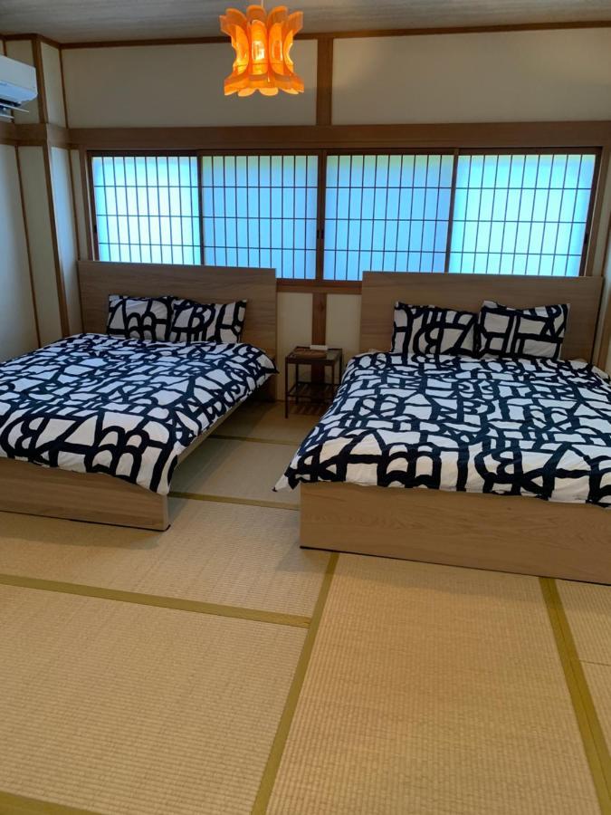 Guest House Apple Ōsaka Extérieur photo
