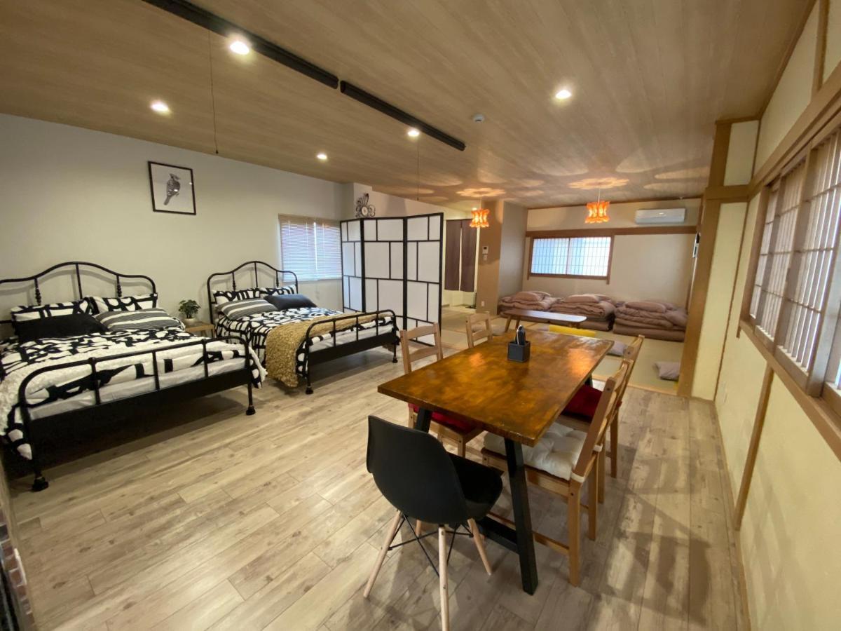 Guest House Apple Ōsaka Extérieur photo